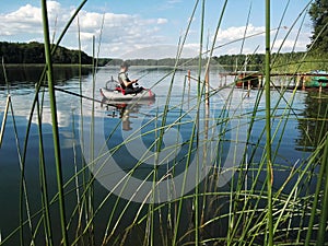 Angler with Belly Boat