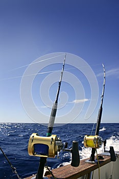 Angler boat big game fishing in saltwater photo