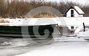 Angler boat on river Zala in witertime