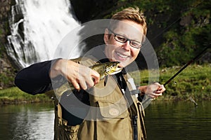 Angler with Brown trout