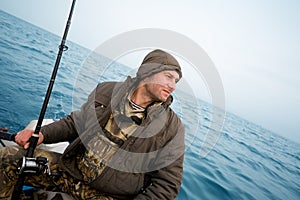 Angler catches a salmon trolling