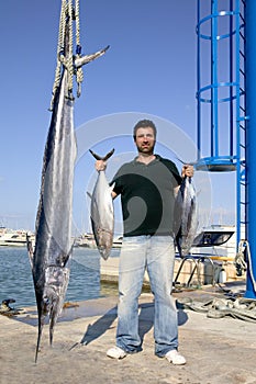 Angler fish catch albacore tuna and spearfish photo