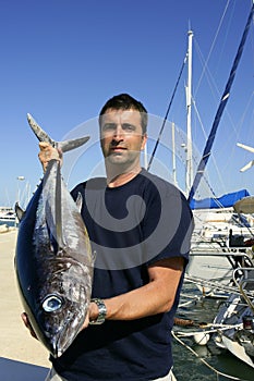 Angler fishing big game Albacore tuna photo