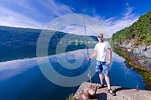 Angler and Norwegian fjord