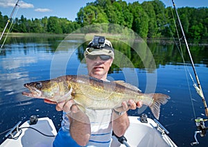 Angler with walleye fish