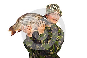 Angler woman showing big carp