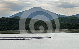 Anglers fish on a lake at a resort in the outskirts.