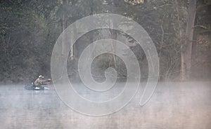 Anglers fishing on a Lake photo