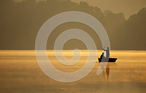 Anglers Fishing on a Lake photo