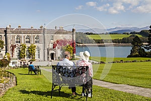 Anglesey, Wales. UK. 8th September, 2015. Retired Couple enjoying the view at Plas Newydd Country House and Gardens.