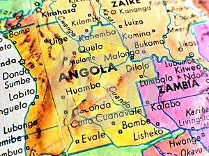 Angola Africa focus macro shot on globe map for travel blogs, social media, website banners and backgrounds.