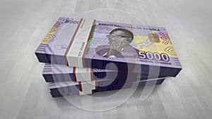 Angola Kwanza money banknote pile packs animation