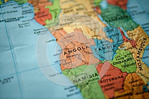 Angola on a map. Selective focus on label