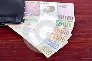 Angolan money in the black wallet