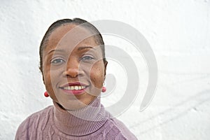 Angolan woman smiling.