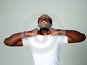 Angry african man screaming