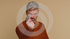 Angry aggressive old man showing fig negative gesture, you dont get it anyway, rapacious, avaricious