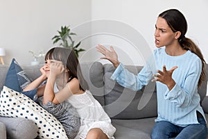 Angry annoyed mom shouting scolding for discipline lecturing stu