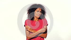 Angry annoyed woman raising hand up to say no stop. Sceptical and distrustful look, feeling mad at someone. Afro girl