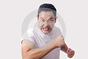 Angry Asian Man Expression Ready to Fight