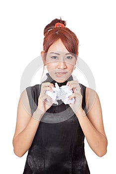 Angry Asian office girl crumple paper with both hand