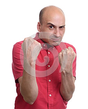 Angry bald man ready for a fight