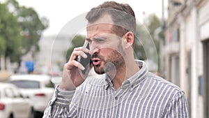 Angry Beard Casual Man Talking on Phone
