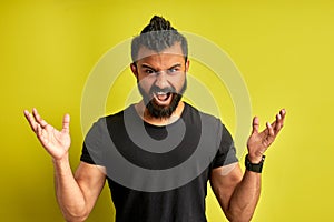 Angry bearded male scream at camera isolated