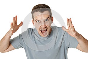 angry bearded man shouting on white studio background