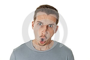 angry bearded man shouting on white studio background