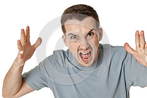 angry bearded man shouting on white studio background