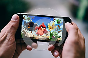 COLOGNE, GERMANY - FEBRUARY 27, 2018: Angry Birds App Game played on Apple iPhone