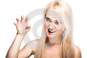 Angry blond girl snowing her sharp fingernails