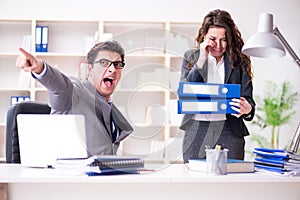 The angry boss unhappy with female employee performance