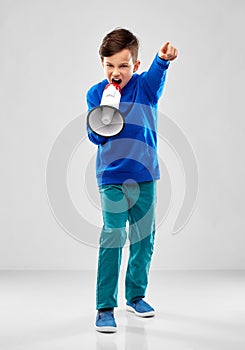 Angry boy speaking to megaphone