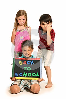 Angry Boys and Girl with Back To School Sign