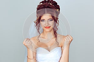 Angry bride. Closeup portrait upset young woman showing fists about to punch hit someone or to have nervous atomic breakdown