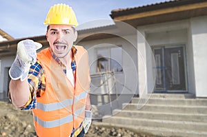 Angry builder screaming at somebody