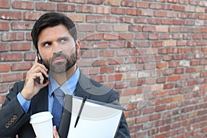 Angry businessman calling by phone