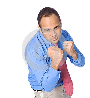 Angry businessman with fist ready to fight.