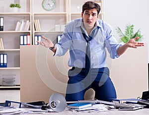 Angry businessman frustrated with too much work