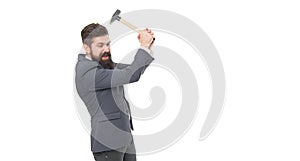 Angry businessman holding hammer isolated on white. Professional man got angry. Anger management