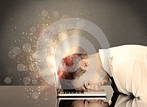 Angry businessman with lights and keyboard