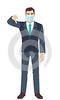Angry Businessman with medical mask showing thumb down gesture as rejection symbol. Full length portrait of Businessman in a flat