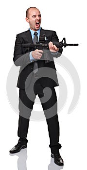 Angry businessman with rifle