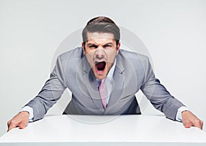 Angry businessman screaming