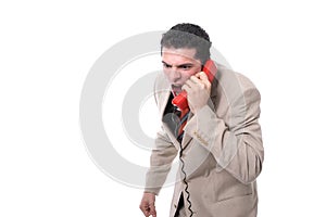 Angry businessman shouting on the phone