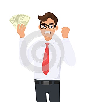 Angry businessman showing cash, money and making raised hand fist gesture sign. Frustrated person holding currency notes.
