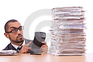 Angry businessman with stack