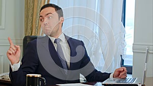 Angry businessman talk, waving his hands